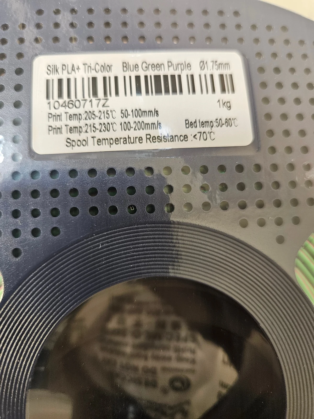 The actual spool label and speed-dependent temperature ranges.